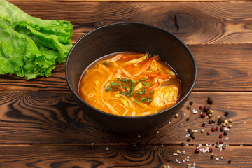 spicy chicken soup with vegetables and tamagoyaki