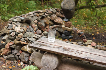 plastic Cup at the spring with water