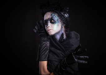 Halloween photo shoot Day of the dead on a black background with in the studio.