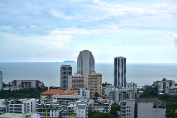 Look from the high, see the city in the city that is full of tall buildings and the sea. Beautiful, comfortable view
