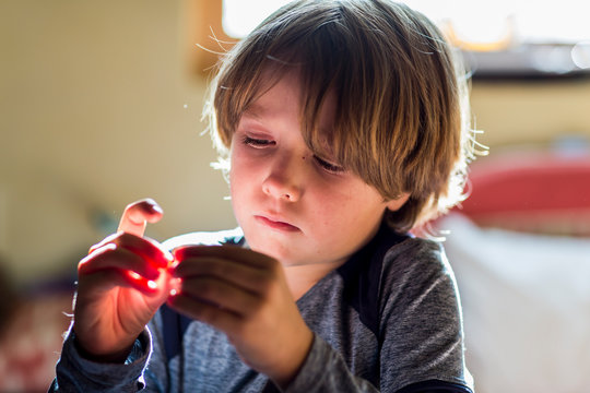 6 year old boy playing in his room