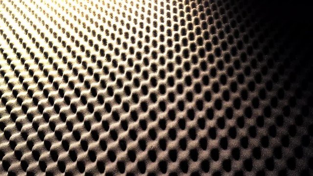 Geometric background from acoustic foam and night to day lighting in a seamless and endless loop
