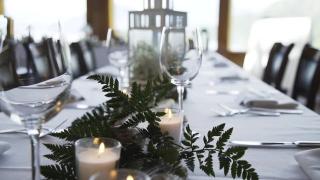 Dinner table setup for event wedding in beautiful settings 