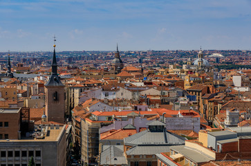 Naklejka na ściany i meble Aerial view of the Madrid cityscape with Almudena Cathedral rooftops in the city center in Madrid, Spain
