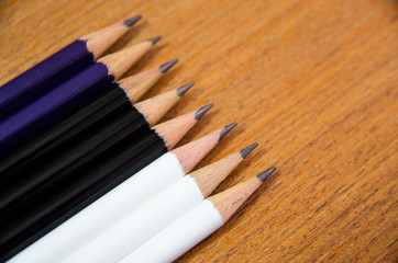 Obraz premium pencil on wooden table with space on side view