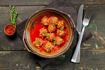 Meatballs with rise in tomato sauce