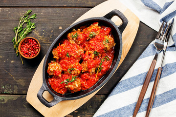 Meatballs with rise in tomato sauce