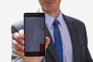 businessman holding smartphone in hand