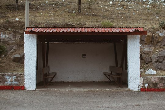 Old building next to a hill