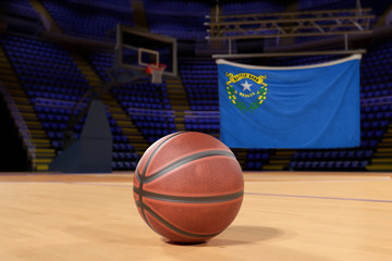 Naklejka premium Nevada state flag and basketball on Court Floor