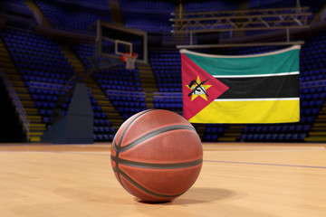 Mozambique flag and basketball on Court Floor