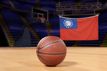 Myanmar flag and basketball on Court Floor