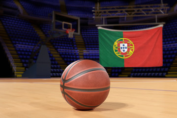 Naklejka premium Portugal flag and basketball on Court Floor