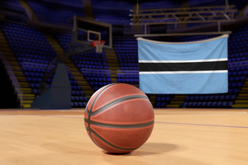 Botswana Botswana flag and basketball on Court Floor