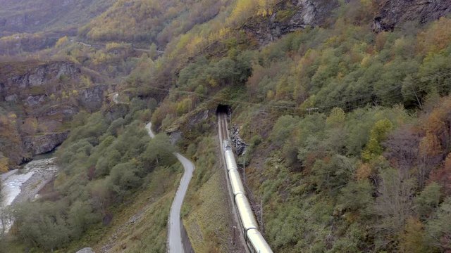 The Flam to Myrdal Train Passing Through Beautiful Landscapes