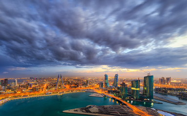 Fototapeta na wymiar Aerial view of architecture and newly constructed areas with beautiful clouds in Manama, Bahrain