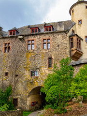 Fototapeta na wymiar Neuerburg Castle in Neuerburg, Rhineland-Palatinate, Germany exterior partial view