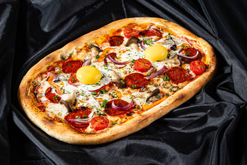 pizza with eggs and sausage