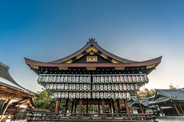 Maidono (Dance Hall) of Yasaka Jinja Shinto Shrine. Hanging Lanterns (Chouchin or Chochin) with name of donors at Yasaka Shinto Shrine.