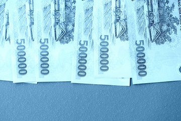 Five hundred thousand vietnamese dongs close up. Money background blue color toned