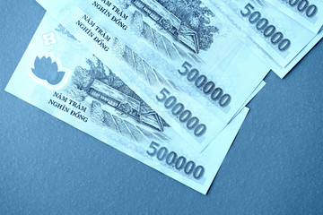 Five hundred thousand vietnamese dongs close up. Money background blue color toned