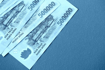 Five hundred thousand vietnamese dongs close up. Money background blue color toned