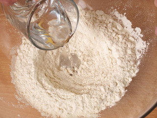 Add water into flour. Making Puff Pastry Series.