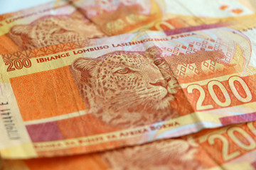 South African money, stacked, piled currency, two hundred rand notes 