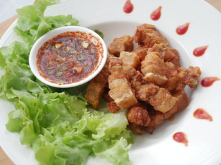 Crispy pork with spicy sauce