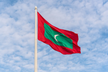 Flag of Maldives waving on flag post