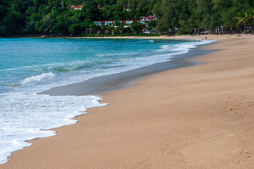 Ocean waves on the sandy beach