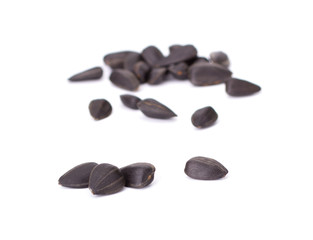 Sunflower black seeds isolated on white background