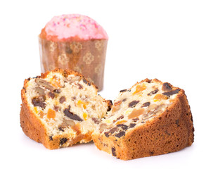 Fresh sliced fruit cake isolated on white background