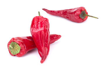 Dried red chili or chilli cayenne pepper isolated on white background cutout closeup