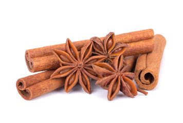 Spicy Cinnamon Sticks and Anise isolated on White background closeup macro shot