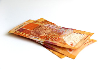 South African money, stacked, piled currency, two hundred rand notes 