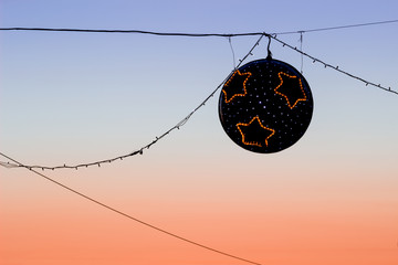 christmas street lights at sunset