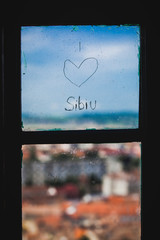Sibiu city view through the window "i love Sibiu"