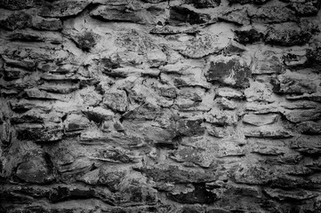 Black and white stone wall texture, masonry background
