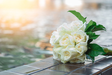 Beautiful wedding  bouquet of white rose flowers for the bride