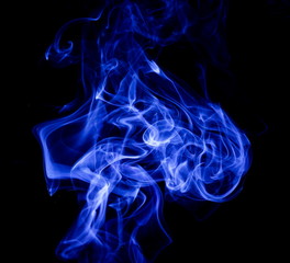 Blue smoke on black background