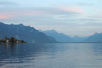 geneva lake in the mountains in sunset