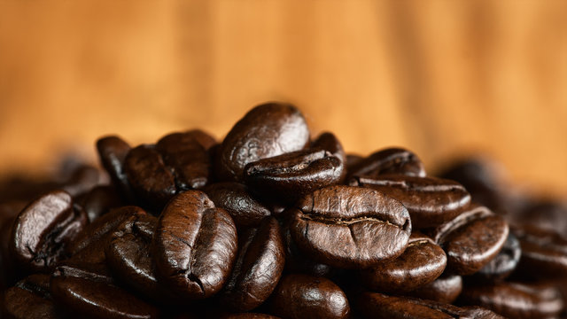 closeup background of roasted arabica coffee beans