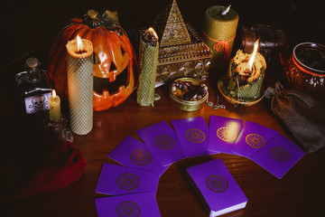  Mystical atmosphere, view of tarot card on the table, esoteric concept, fortune telling and predictions. 
