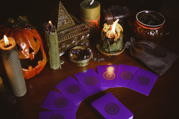  Mystical atmosphere, view of tarot card on the table, esoteric concept, fortune telling and predictions. 