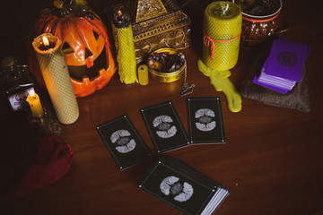  Mystical atmosphere, view of tarot card on the table, esoteric concept, fortune telling and predictions. 