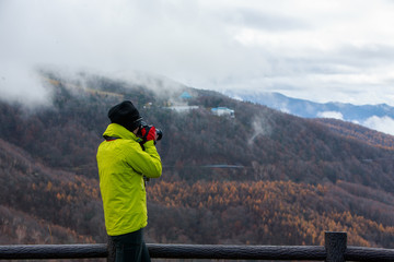 Fototapeta na wymiar hiker on the top of mountain