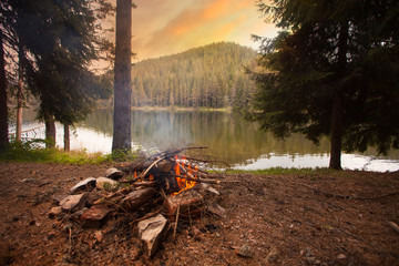 Campfire On Lakeshore, bulgarian mountains, dusk time