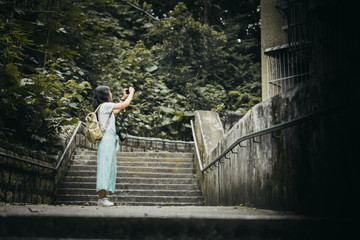 Obraz premium Asian women with camera Traveling in Macau.