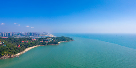 Fototapeta na wymiar Waterfront view of Guantouling National Forest Park, Guangbei Hai City